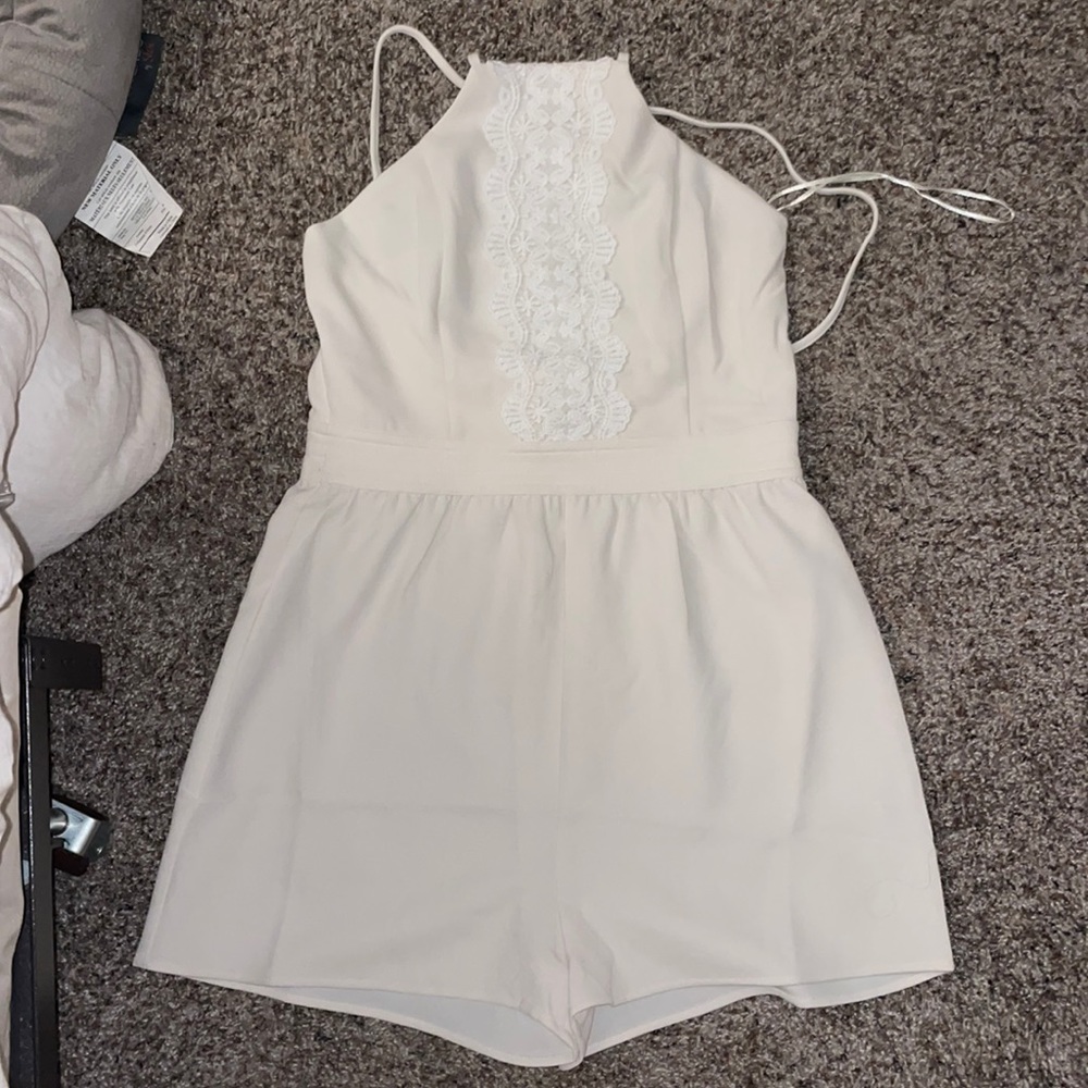 Never worn, floral white lace design